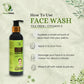 In this image, a bottle of tea tree essential face wash, a natural skin care product by Herbstonic and instructions are written on how to use it.