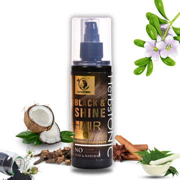 This image shows herbstonic herbal hair care product, black and shine hair oil, it has natural ingredients like coconut oil, cumin seeds, neem etc.