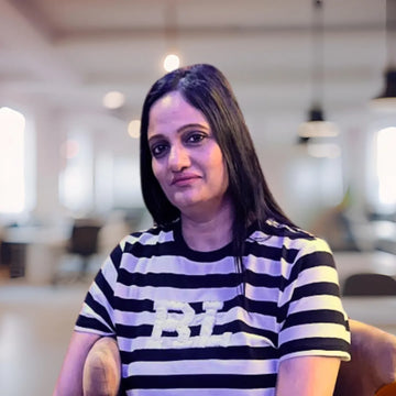 Image of a lady wearing a tshirt. She is founder of Herbstonic- Poonam Mittal